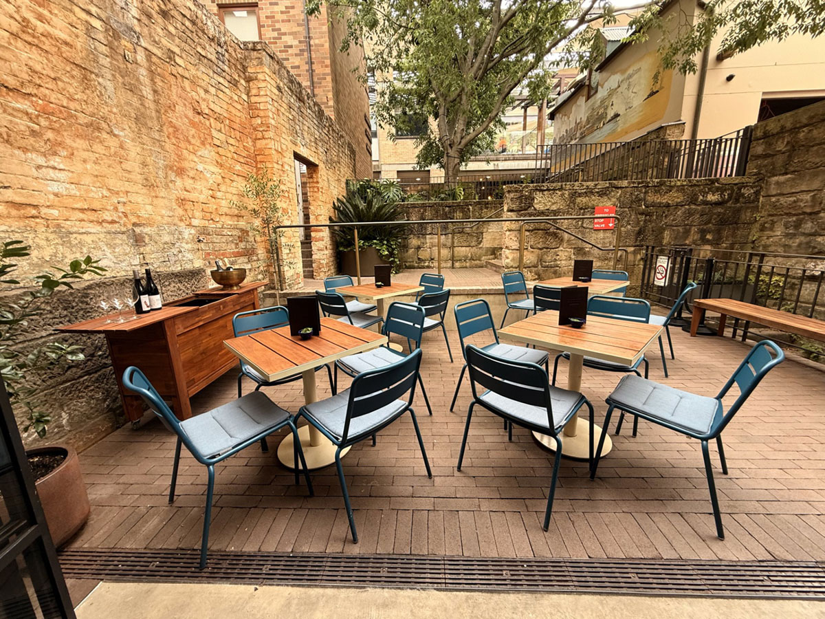 Garden Bar tables in the courtyard behind Barrelhouse Cellars
